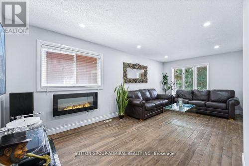 2840 Tradewind Drive, Mississauga, ON - Indoor Photo Showing Living Room With Fireplace