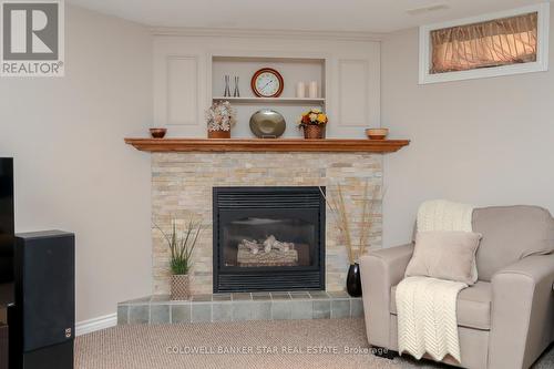 7 Wright Crescent, St. Thomas, ON - Indoor Photo Showing Living Room With Fireplace