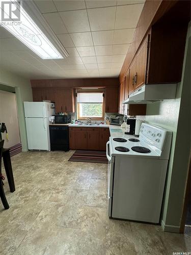 710 Prince Street, Hudson Bay, SK - Indoor Photo Showing Kitchen With Double Sink