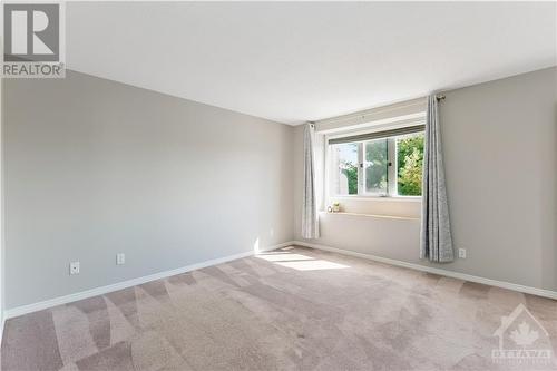 Upstairs, you'll find three spacious bedrooms, including a primary retreat with 2 large walk-in closets, a cheater ensuite and a cozy window nook—ideal for unwinding after a long day. - 859 Nesting Way, Ottawa, ON - Indoor Photo Showing Other Room