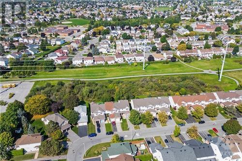 Enjoy nearby amenities like Linda Dunn & Valin Park, a splash pad, bike paths, and a variety of schools, walking  distance to stores and restaurants. - 859 Nesting Way, Ottawa, ON - Outdoor With View