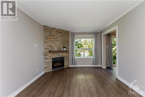 859 Nesting Way, Ottawa, ON - Indoor Photo Showing Living Room With Fireplace