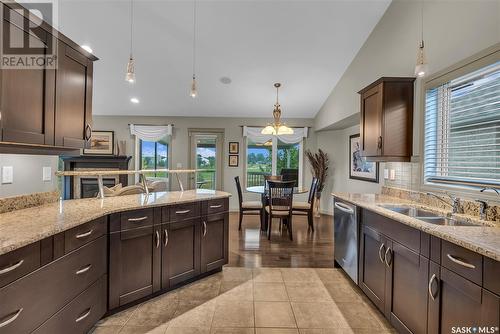 106 802 Heritage Crescent, Saskatoon, SK - Indoor Photo Showing Kitchen With Double Sink With Upgraded Kitchen