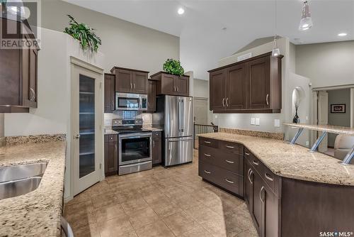 106 802 Heritage Crescent, Saskatoon, SK - Indoor Photo Showing Kitchen With Stainless Steel Kitchen With Double Sink With Upgraded Kitchen