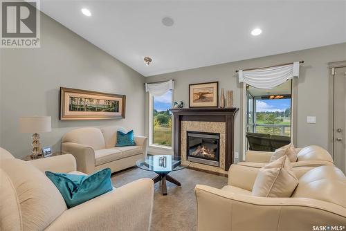 106 802 Heritage Crescent, Saskatoon, SK - Indoor Photo Showing Living Room With Fireplace