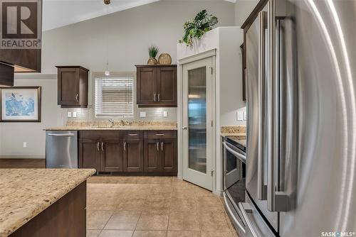 106 802 Heritage Crescent, Saskatoon, SK - Indoor Photo Showing Kitchen With Stainless Steel Kitchen With Upgraded Kitchen