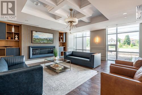 902 - 470 Dundas Street E, Hamilton, ON - Indoor Photo Showing Living Room With Fireplace