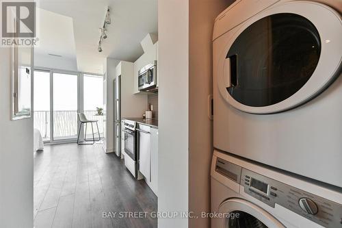 4607 - 42 Charles Street E, Toronto, ON - Indoor Photo Showing Laundry Room