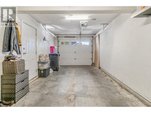 102 3825 Glen Canyon Drive, West Kelowna, BC - Indoor Photo Showing Garage