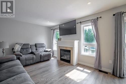 93 Bradley Avenue, Hamilton (Binbrook), ON - Indoor Photo Showing Living Room With Fireplace