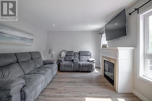 93 Bradley Avenue, Hamilton, ON - Indoor Photo Showing Living Room With Fireplace