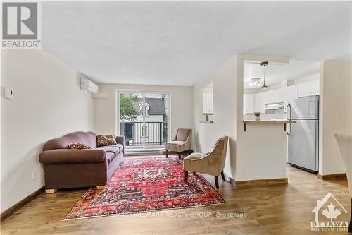 203 - 50 Burnside Avenue, Ottawa, ON - Indoor Photo Showing Living Room