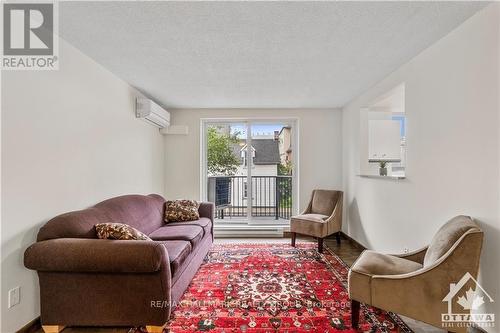 203 - 50 Burnside Avenue, Ottawa, ON - Indoor Photo Showing Living Room