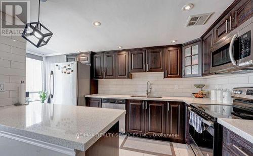 1107 - 350 Webb Drive, Mississauga, ON - Indoor Photo Showing Kitchen With Upgraded Kitchen