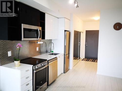 306 - 10 De Boers Drive, Toronto, ON - Indoor Photo Showing Kitchen With Stainless Steel Kitchen With Upgraded Kitchen