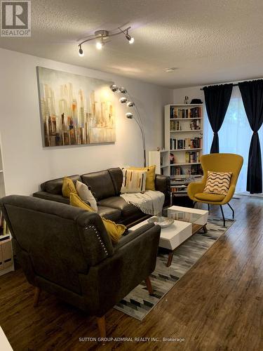 #14 - 35 Four Winds Drive, Toronto, ON - Indoor Photo Showing Living Room