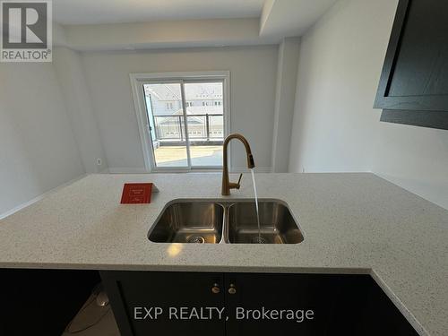 387 Inspire Blvd Boulevard W, Brampton, ON - Indoor Photo Showing Kitchen With Double Sink