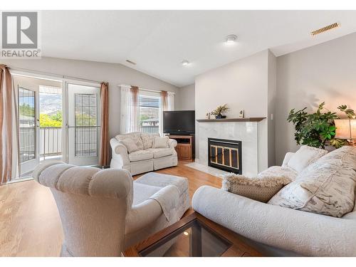 3146 Paris Street Unit# 209, Penticton, BC - Indoor Photo Showing Living Room With Fireplace