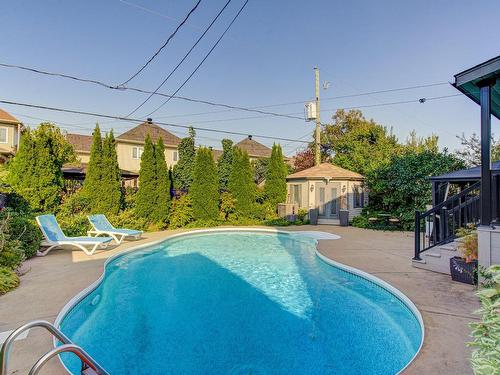 Pool - 7497 Rue Des Perce-Neige, Longueuil (Saint-Hubert), QC - Outdoor With In Ground Pool With Backyard