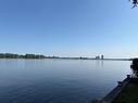 Vue sur l'eau - 191 Rue Saraguay E., Montréal (Pierrefonds-Roxboro), QC  - Outdoor With Body Of Water With View 