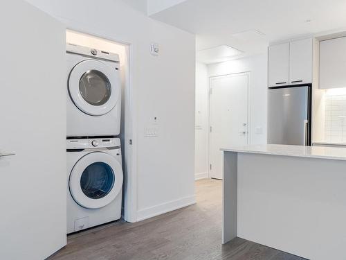 Salle de lavage - 808-1150 Boul. René-Lévesque E., Montréal (Ville-Marie), QC - Indoor Photo Showing Laundry Room