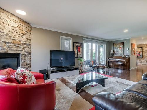 Living room - 2-658 Rue Des Sureaux, Boucherville, QC - Indoor Photo Showing Living Room With Fireplace