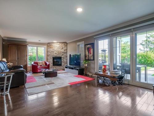 Living room - 2-658 Rue Des Sureaux, Boucherville, QC - Indoor Photo Showing Living Room With Fireplace