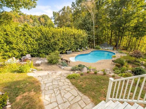 Pool - 349 Rue Woodcroft, Hudson, QC - Outdoor With In Ground Pool With Backyard