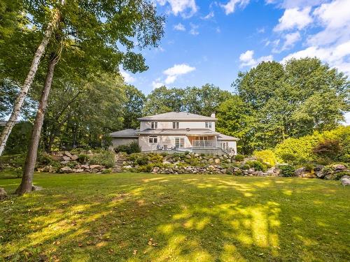 Back facade - 349 Rue Woodcroft, Hudson, QC - Outdoor With Deck Patio Veranda