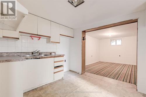 38 Ilfracombe Crescent, Toronto, ON - Indoor Photo Showing Kitchen With Double Sink