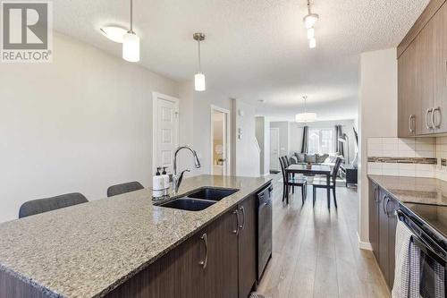 1311 Auburn Bay Circle Se, Calgary, AB - Indoor Photo Showing Kitchen With Double Sink With Upgraded Kitchen