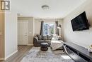 1311 Auburn Bay Circle Se, Calgary, AB  - Indoor Photo Showing Living Room 