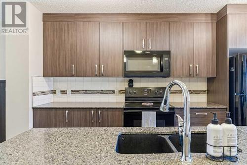 1311 Auburn Bay Circle Se, Calgary, AB - Indoor Photo Showing Kitchen