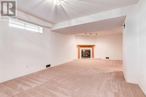 89 Riverview Point Se, Calgary, AB - Indoor With Fireplace