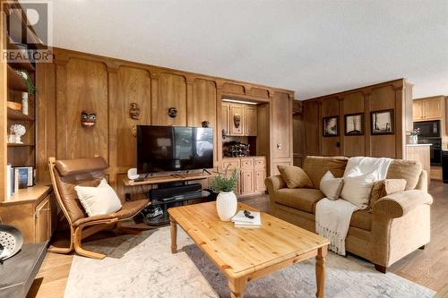 41 Strabane Place Sw, Calgary, AB - Indoor Photo Showing Living Room