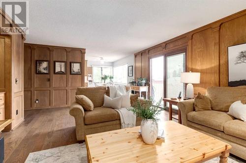 41 Strabane Place Sw, Calgary, AB - Indoor Photo Showing Living Room