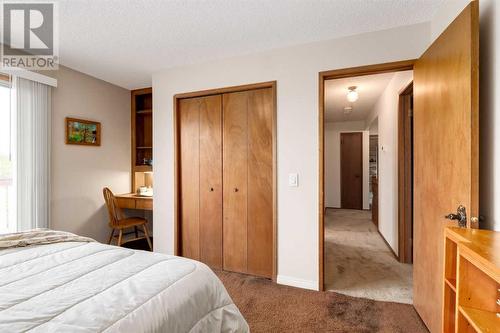 41 Strabane Place Sw, Calgary, AB - Indoor Photo Showing Bedroom