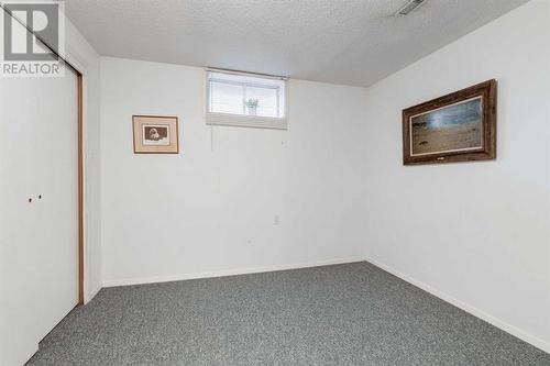 41 Strabane Place Sw, Calgary, AB - Indoor Photo Showing Other Room