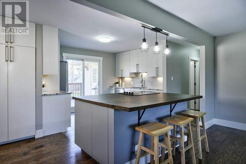 4804 Worcester Drive Sw, Calgary, AB - Indoor Photo Showing Kitchen With Double Sink