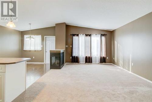 572 Sunridge Crescent W, Lethbridge, AB - Indoor With Fireplace