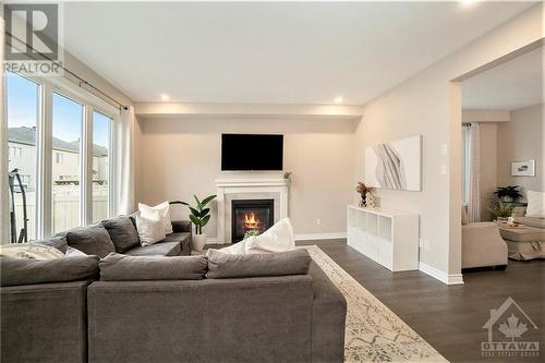 901 Pedigree Street, Stittsville, ON - Indoor Photo Showing Living Room With Fireplace