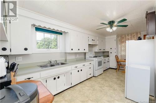 1093 Route 133, Grand-Barachois, NB - Indoor Photo Showing Kitchen With Double Sink