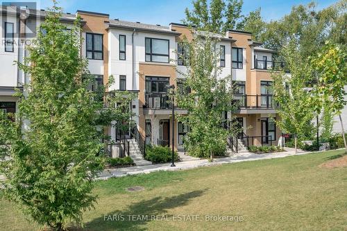 102 - 90 Canon Jackson Drive, Toronto, ON - Outdoor With Facade