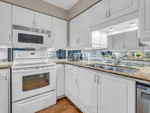 702-12 Rean Dr, Toronto, ON - Indoor Photo Showing Kitchen With Double Sink