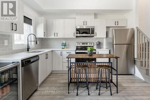 108 Fairlane Avenue, Barrie, ON - Indoor Photo Showing Kitchen With Stainless Steel Kitchen With Double Sink With Upgraded Kitchen