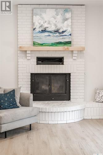 426 Delaronde Road, Saskatoon, SK - Indoor Photo Showing Living Room With Fireplace