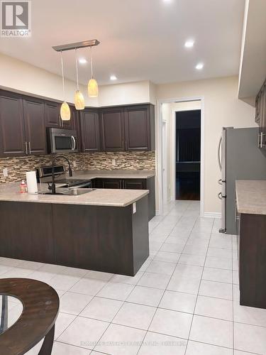 36 Lily Cup Avenue, Toronto, ON - Indoor Photo Showing Kitchen With Double Sink