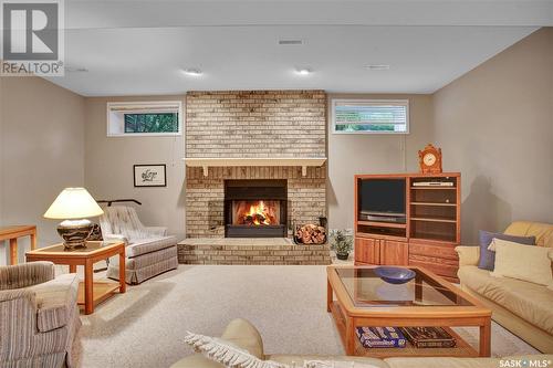 114 801 Heritage Crescent, Saskatoon, SK - Indoor Photo Showing Living Room With Fireplace