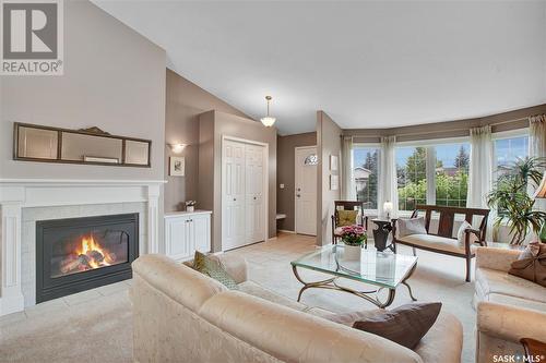 114 801 Heritage Crescent, Saskatoon, SK - Indoor Photo Showing Living Room With Fireplace