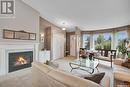 114 801 Heritage Crescent, Saskatoon, SK  - Indoor Photo Showing Living Room With Fireplace 